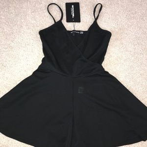 NWT black pretty little thing crossover romper